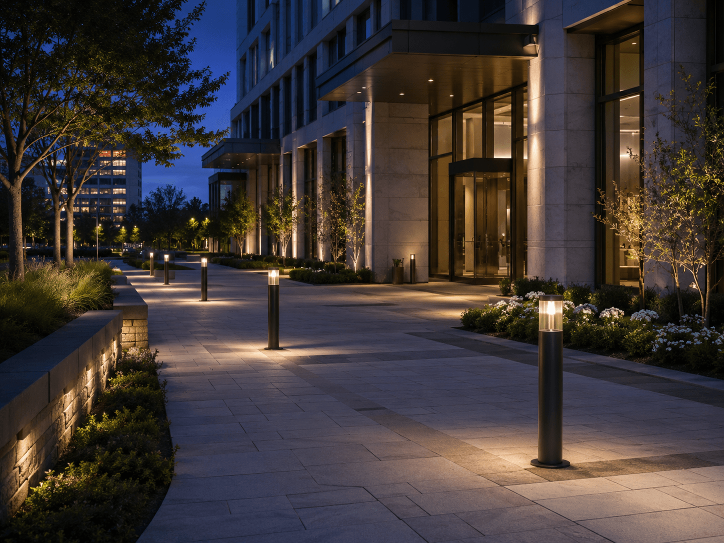 Catalogue decorative outdoor pole luminaires beside a pedestrian entrance