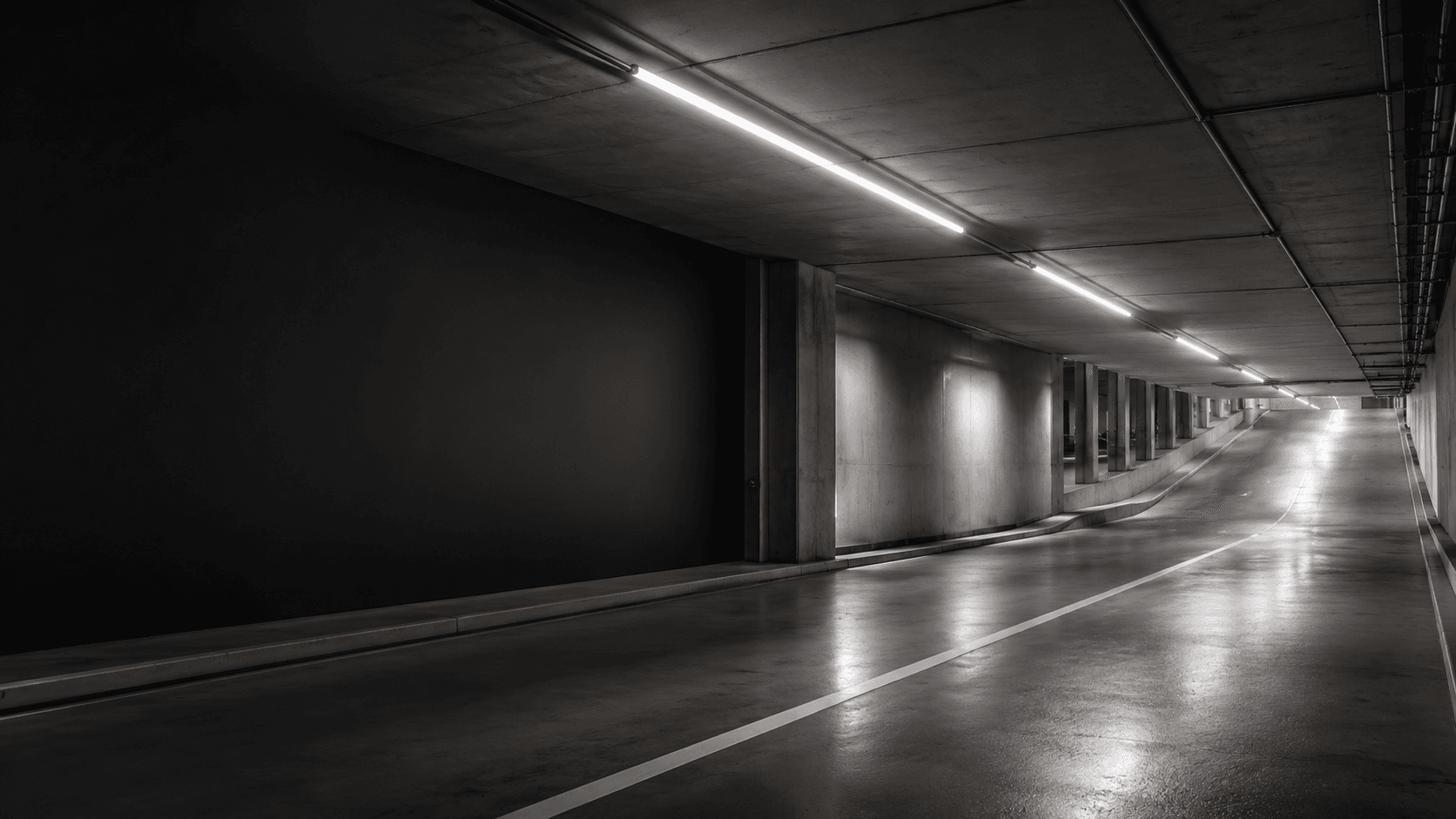 LED-BUS StepDIM Waterproof lighting installed in a car park