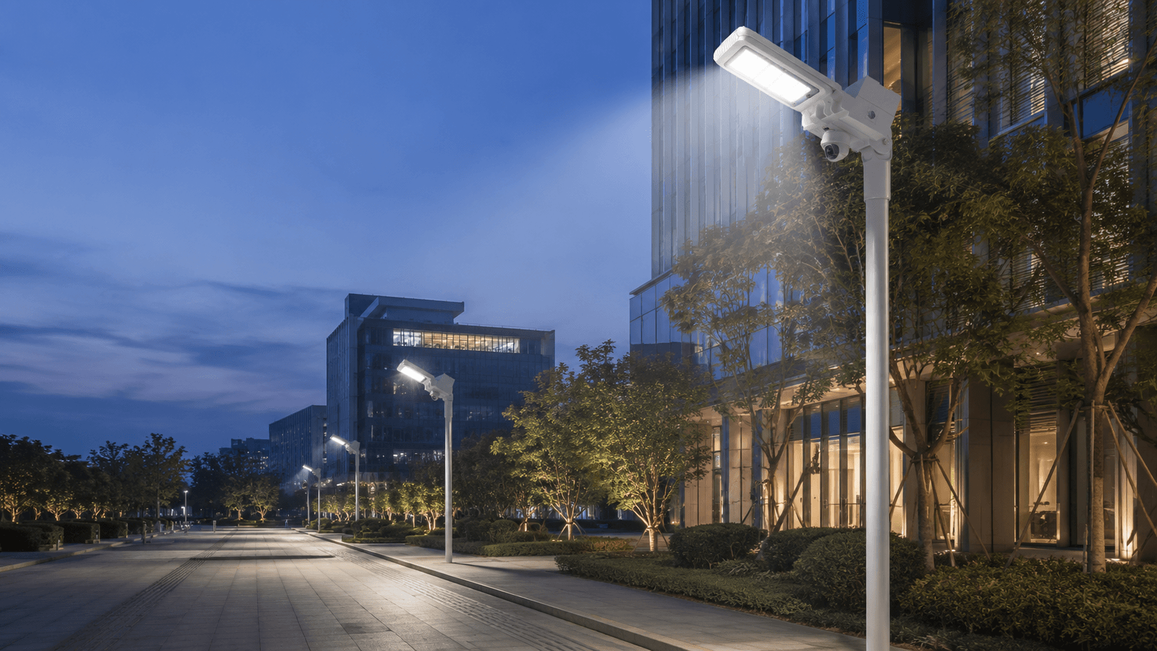 GER-LED smart street luminaires illuminating an urban street at dusk