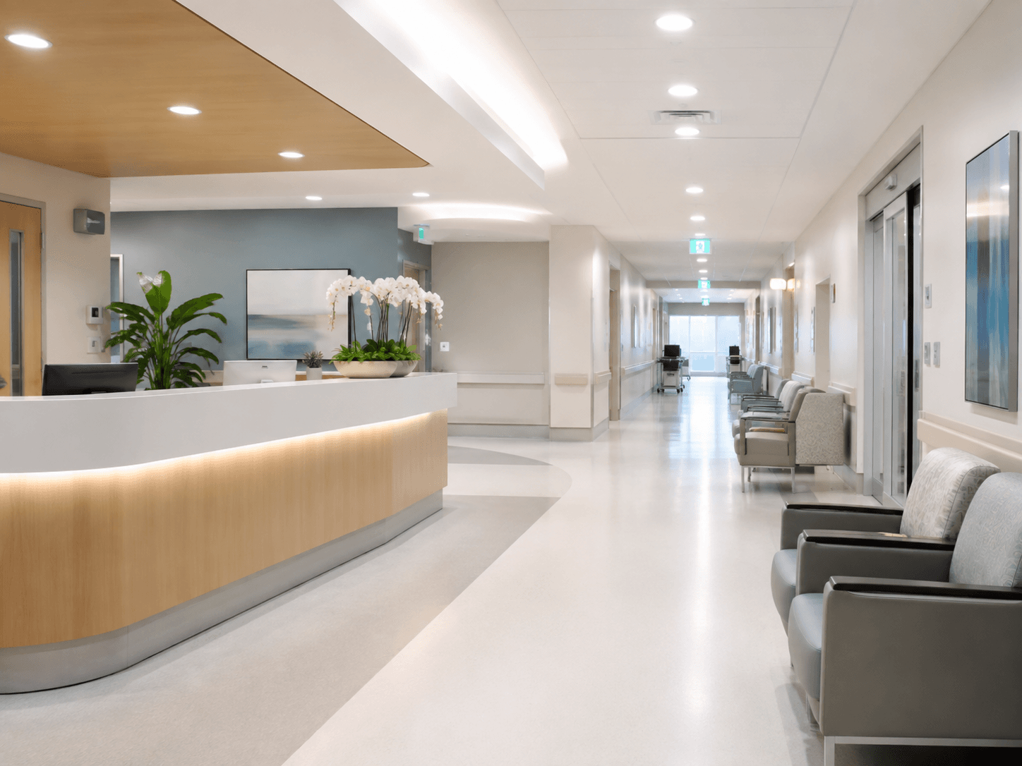 Hospital corridor and reception illuminated by recessed downlights