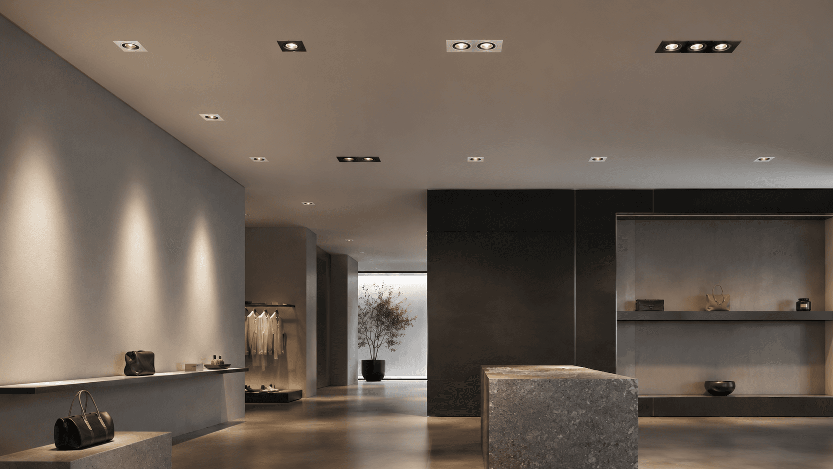 Premium interior illuminated by track and downlight luminaires
