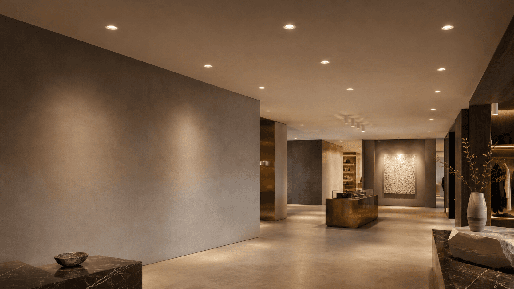 Premium interior illuminated by track and downlight luminaires