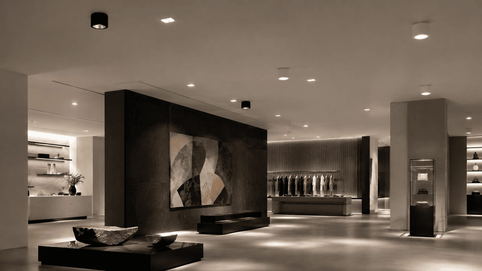 Premium interior illuminated by track and downlight luminaires