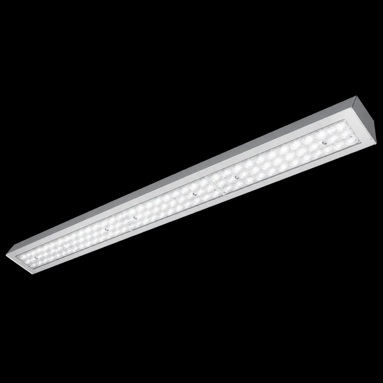 LED-BUS LDBSE luminaire, illuminated, angled view of the multi-lens diffuser strip
